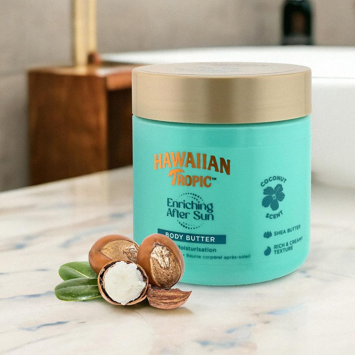 Turquoise pot met gouden deksel, Hawaiian Tropic Body Butter, met sheaboter en kokosgeur.
