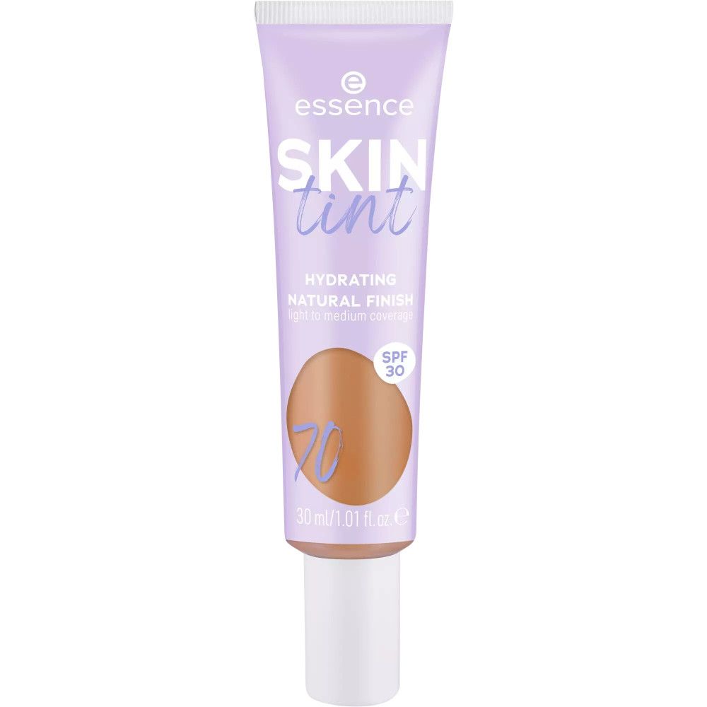 Fond de teint teinté dans un tube violet. Inscription : "SKIN tint", "Hydrating", "SPF 30". Teinte 70.