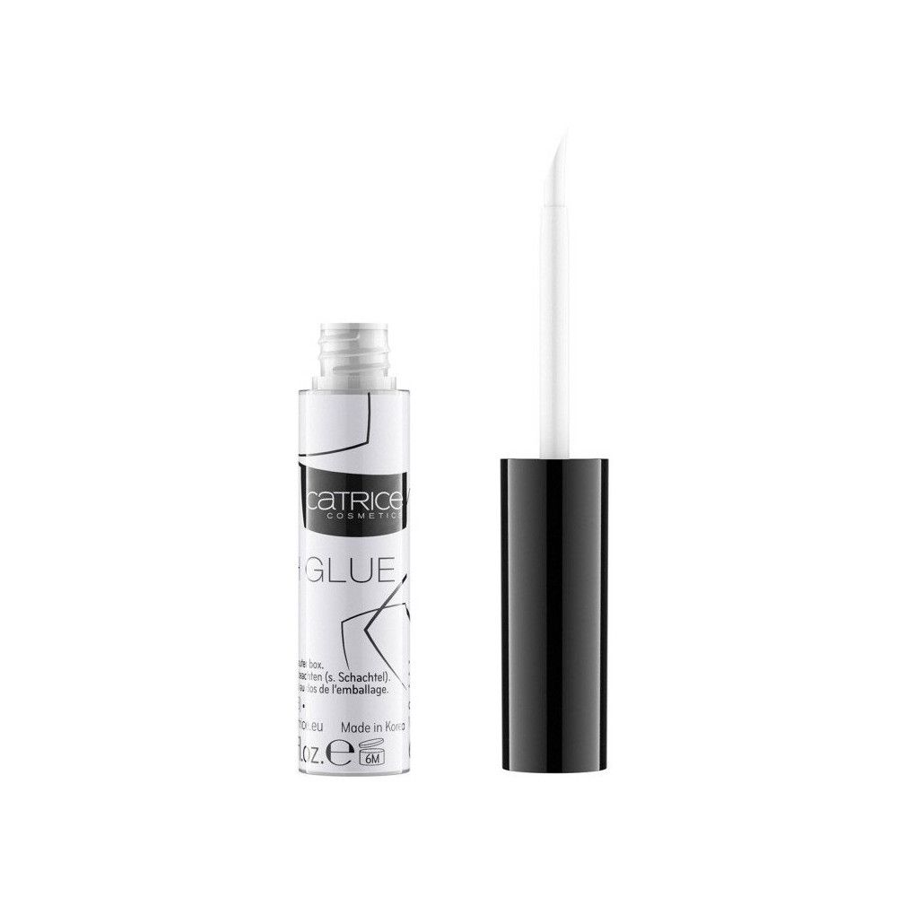 Colle à cils Catrice. Tube blanc, bouchon noir et applicateur. Inscription "GLUE" et logo. Texte.
