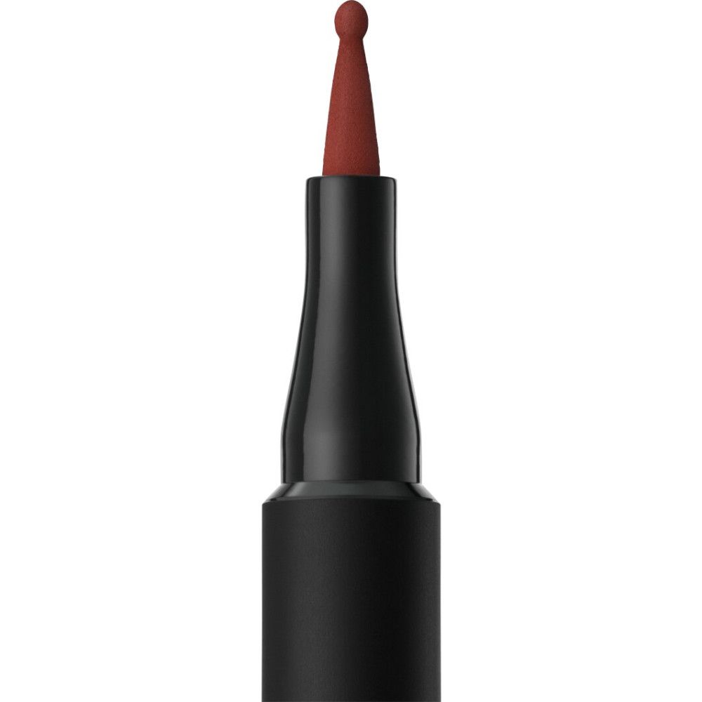 Een zwarte applicator met een roodbruine punt.