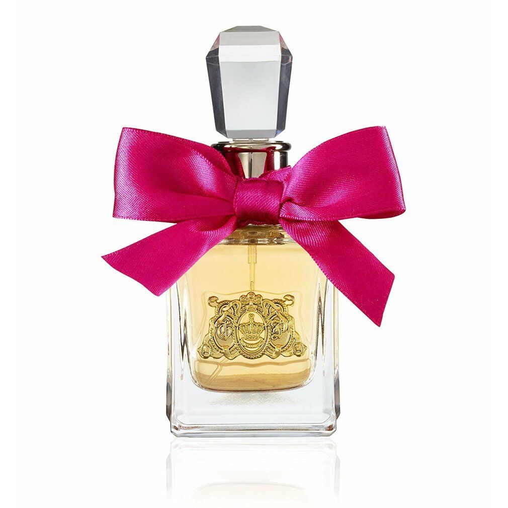 Flacon de parfum avec nœud rose. Flacon en verre rectangulaire avec emblème doré. Bouchon transparent.