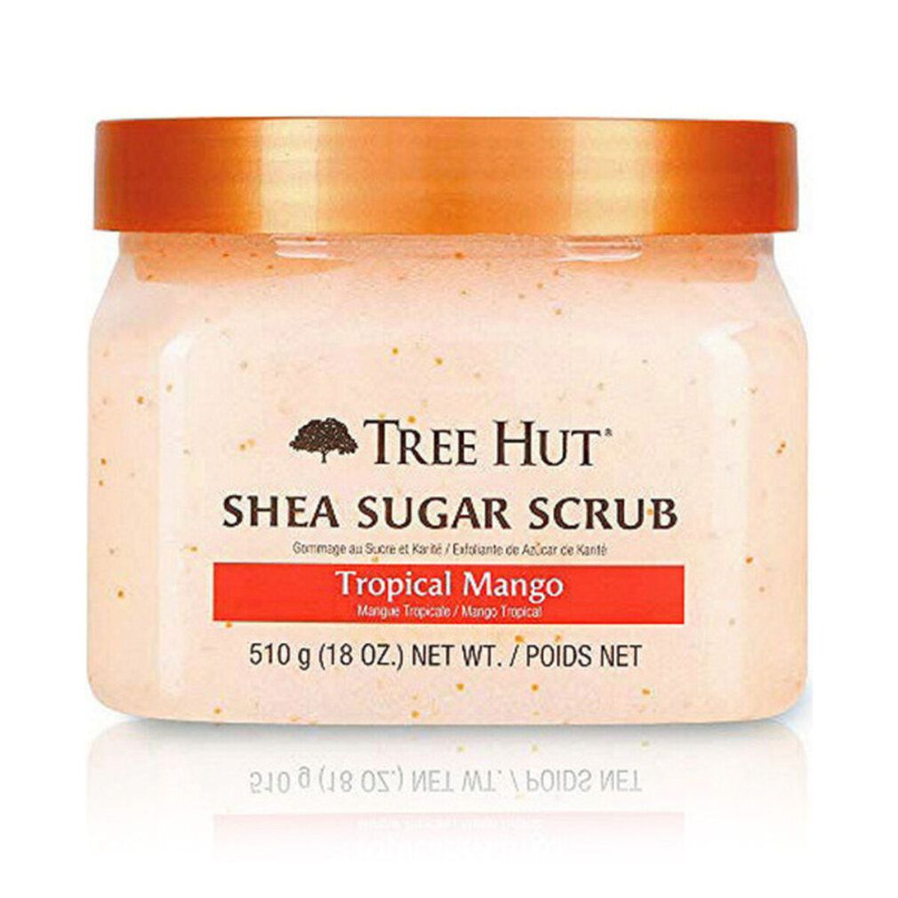 Tree Hut Shea Sugar Scrub Tropical Mango dans un pot transparent avec un couvercle orange.