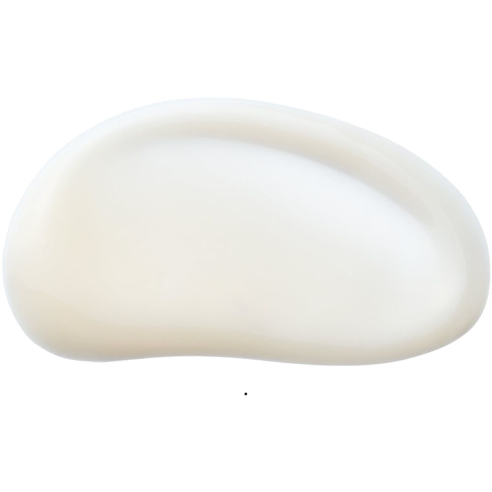 Crème de couleur crème étalée. Forme ovale. Surface lisse.