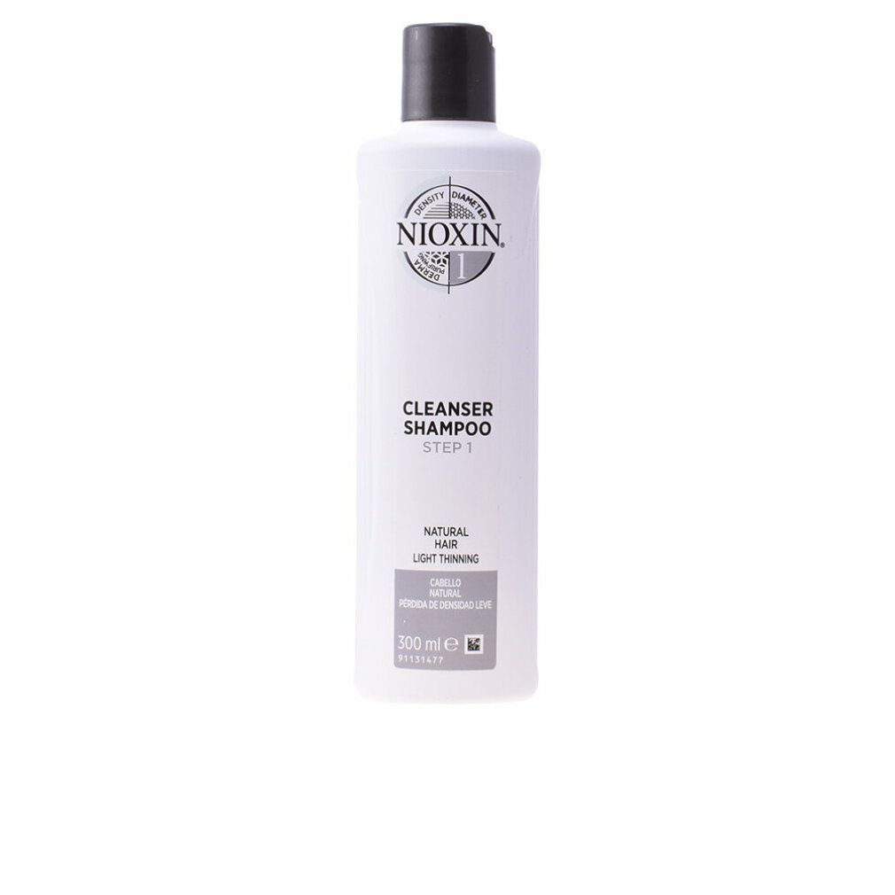 Flacon de shampooing blanc, bouchon noir. Inscription: Nioxin, Cleanser Shampoo, Step 1. Pour cheveux fins. Volume.