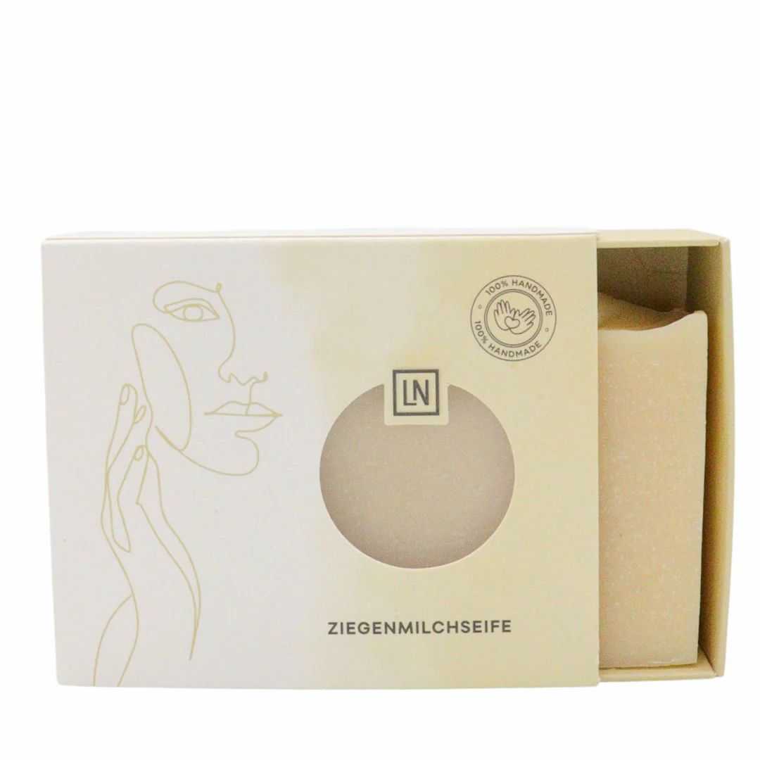 Emballage carton ouvert avec savon. Fenêtre, inscription "ZIEGENMILCHSEIFE". Logo "LN" et "100% HANDMADE".