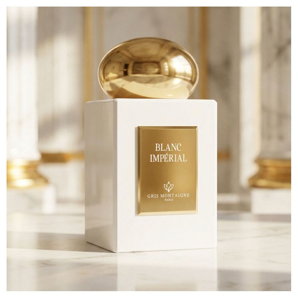 Witte flacon met gouden dop. Gouden etiket met "BLANC IMPÉRIAL" en "GRIS MONTAIGNE PARIS".