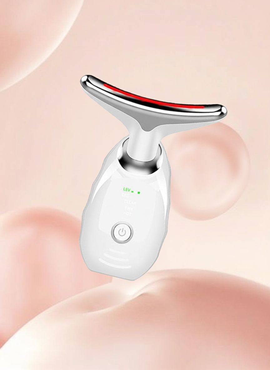 Appareil blanc avec tête incurvée, sur fond rose. Bande lumineuse rouge sur la tête, affichage LED. Formes arrondies.