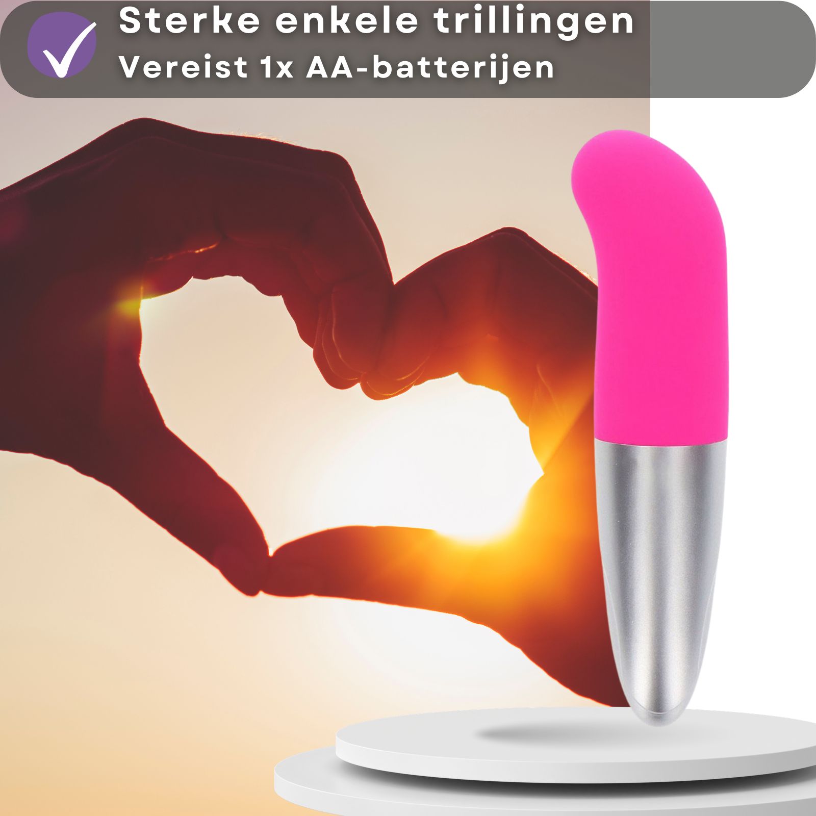 Roze en zilveren vibrator. Sterke vibraties. Vereist AA-batterij.