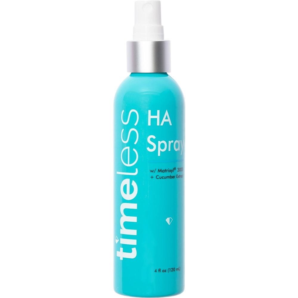 Turquoisekleurige sprayfles met witte sproeikop. Opschrift: timeless, HA Spray, Matrixyl 3000 + Cucumber Extract. 4 fl oz (120 ml).