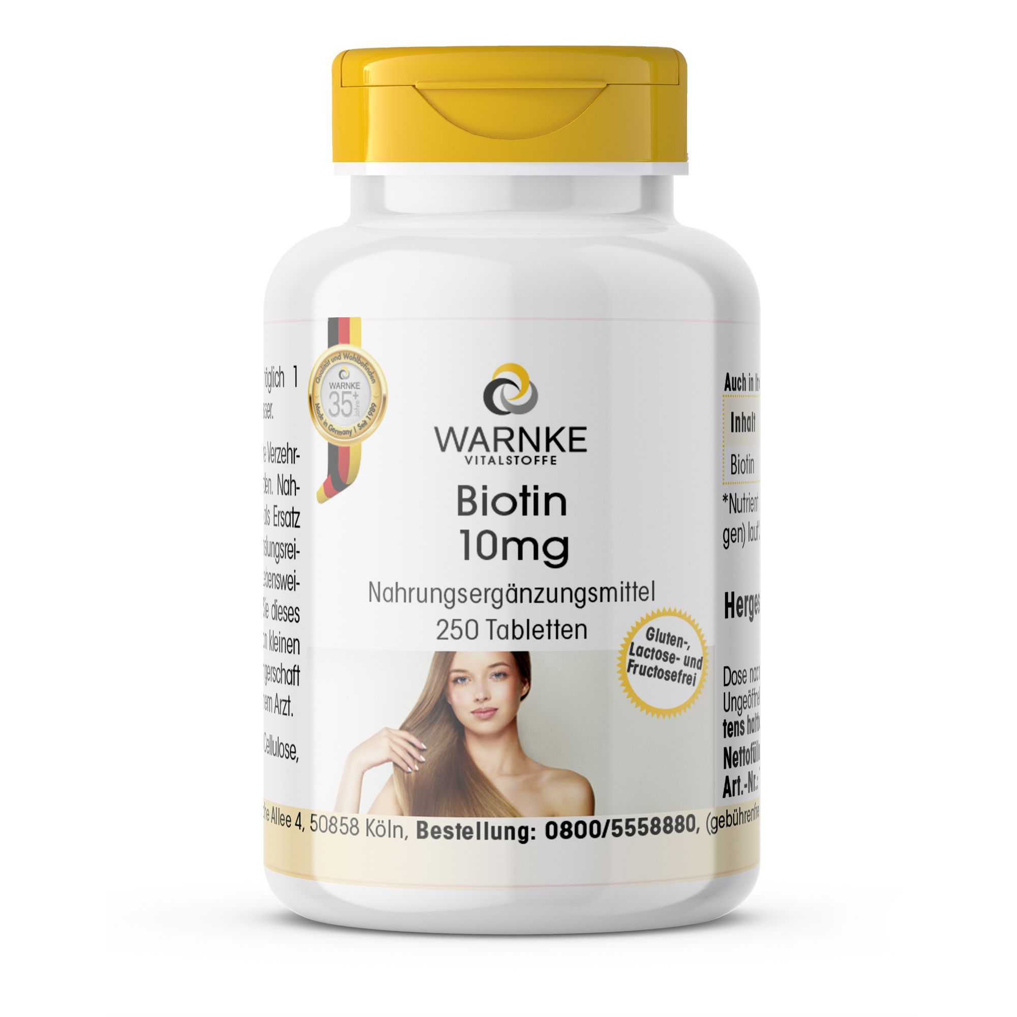 Witte fles met gele dop. Opschrift: WARNKE Vitalstoffe, Biotin 10mg, 250 tabletten. Afbeelding van een vrouw met lang haar. Duits kwaliteitslabel.