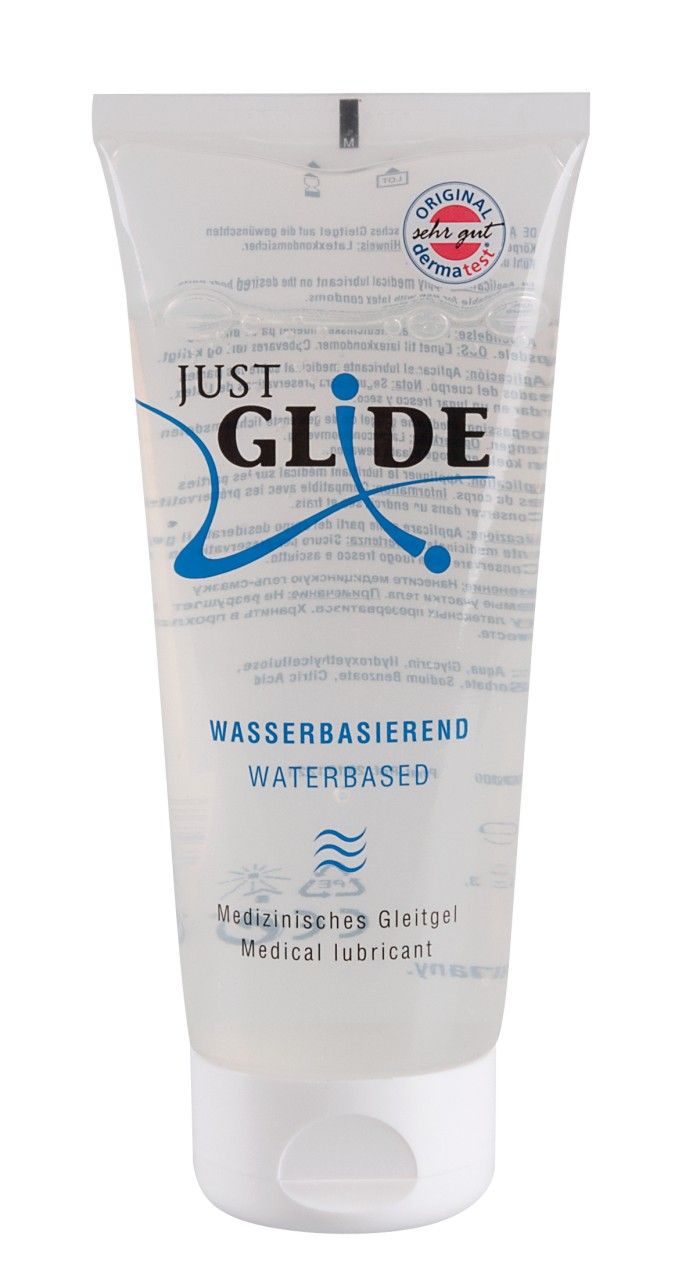 Tube de gel lubrifiant transparent. Inscription: Just Glide, à base d'eau, lubrifiant médical. Sceau.