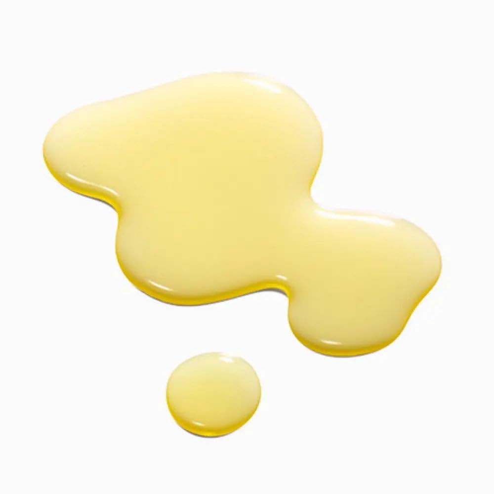 Une tache d'huile jaune doré sur fond blanc.