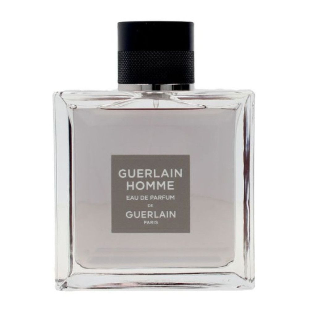 Flacon carré en verre avec bouchon noir. Inscription : Guerlain Homme, Eau de Parfum, Guerlain.