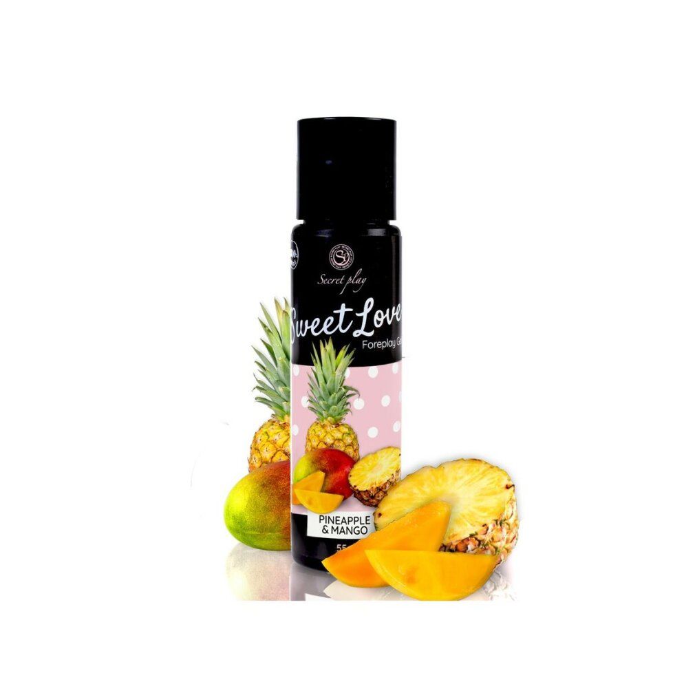 Massagegel met ananas- en mangogeur. Zwarte fles met fruitmotief en fruit.