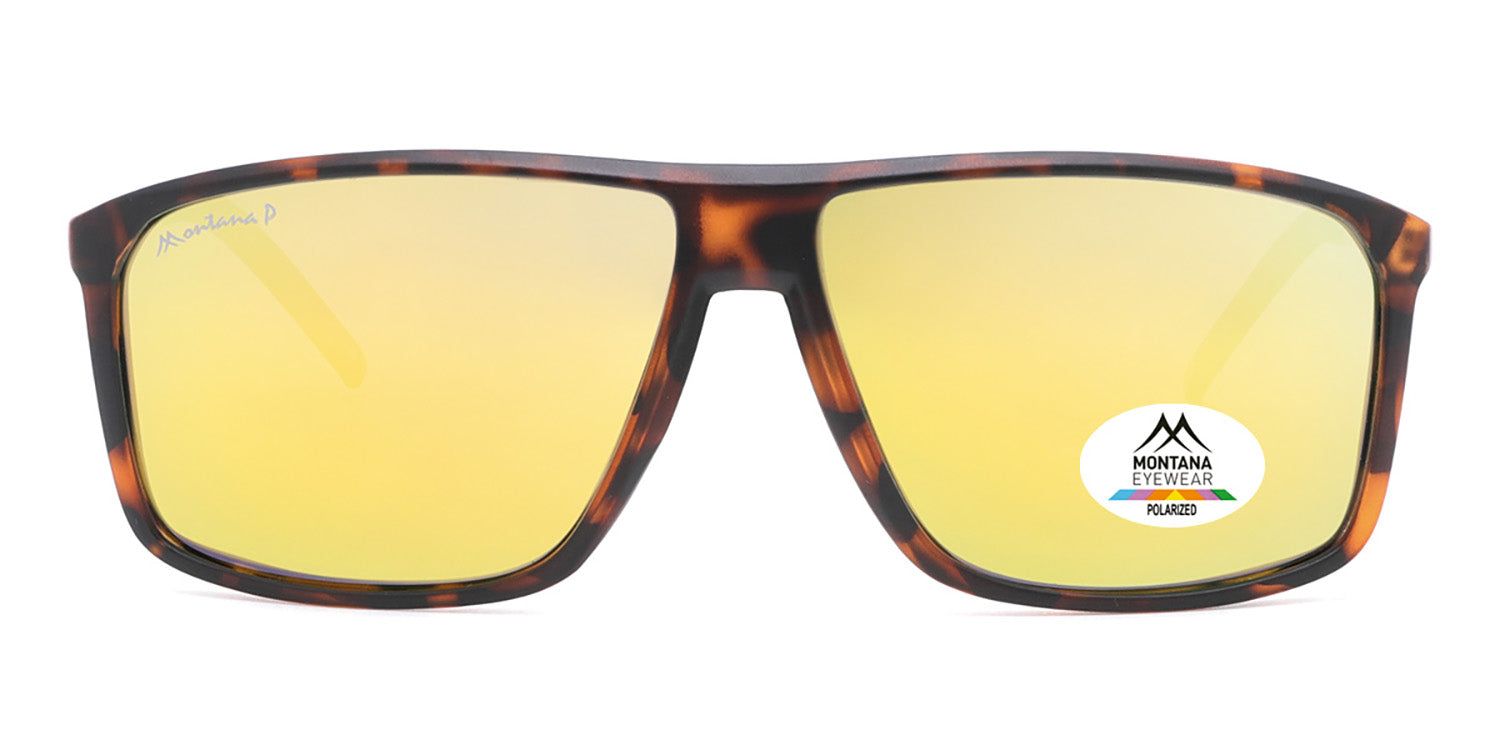 Lunettes de soleil marron avec verres jaunes. Un autocollant avec logo et inscription 'POLARIZED' est visible sur un verre.