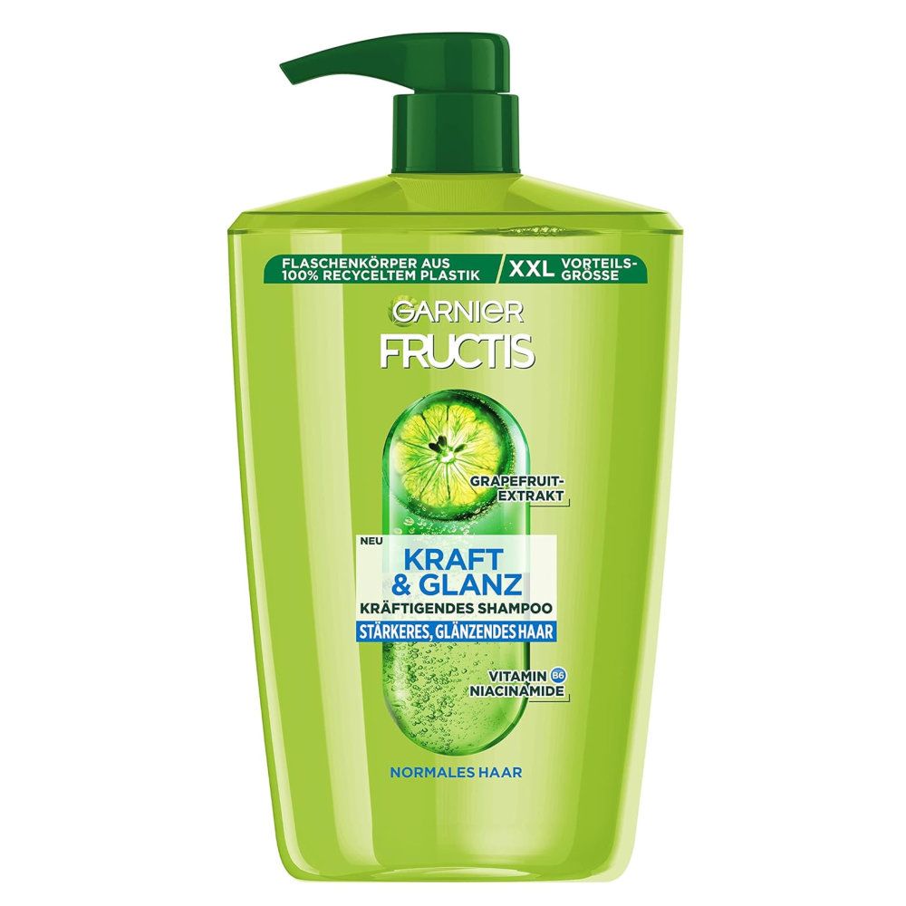 Groene shampoo fles met groene pomp. Opschrift: Garnier Fructis, Kracht & Glans, Grapefruit extract. Fles gemaakt van 100% gerecycled plastic.