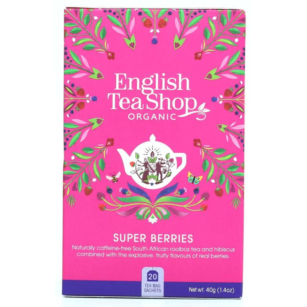 Boîte rose avec English Tea Shop Organic, Super Baies. 20 sachets, poids net 40g. Inscription: Thé Rooibos naturellement sans caféine.