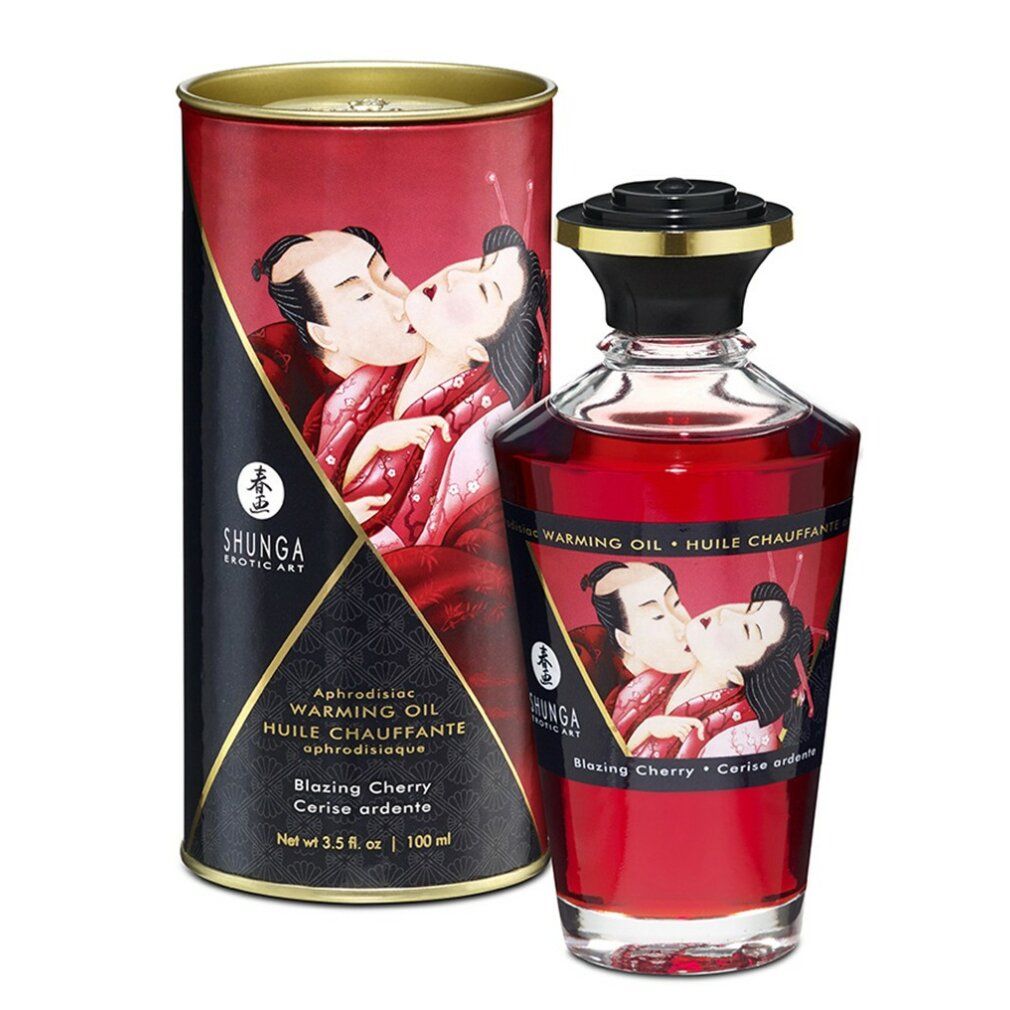 Flacon et boîte cylindrique. Liquide rouge. Illustration d'un couple s'embrassant. Texte: SHUNGA, Warming Oil, Blazing Cherry.