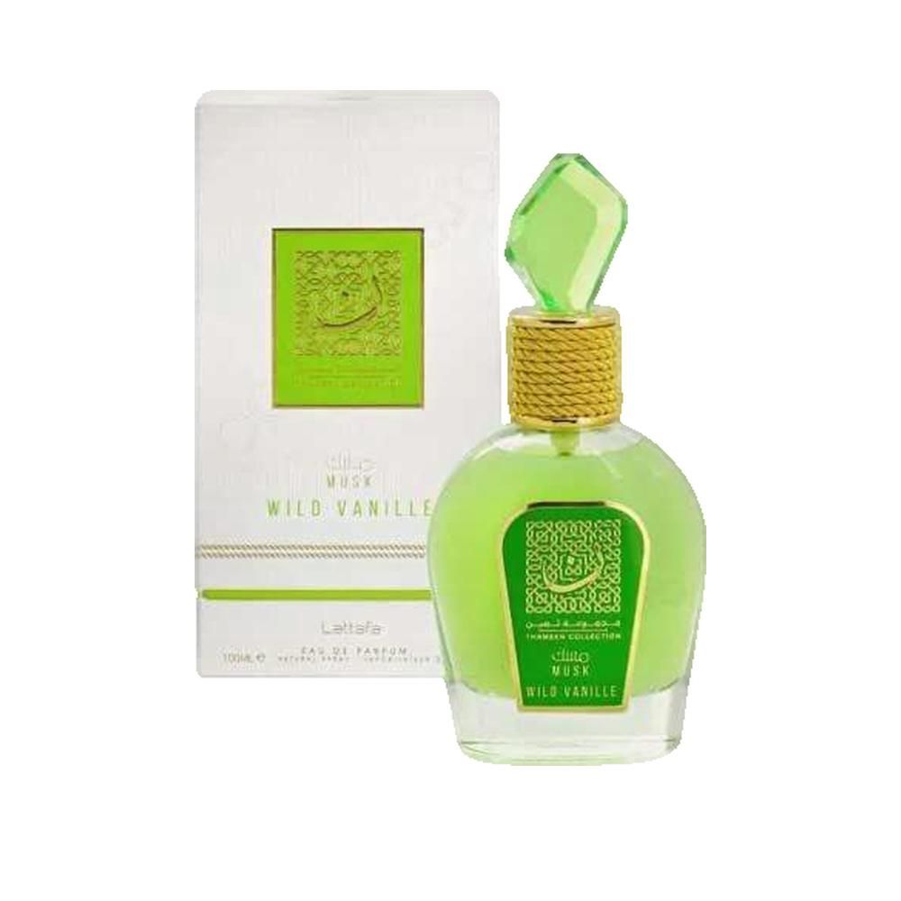 Groene parfumfles met gouden dop en groene kristallen punt. Witte verpakking met groen logo en tekst.