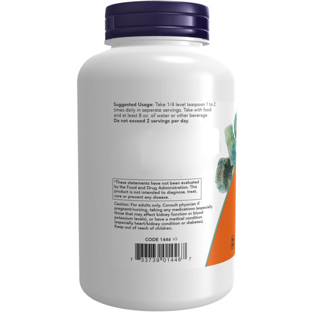 Dos d'un flacon blanc. Étiquette orange avec instructions d'utilisation. Contient des informations sur le dosage. Code 1446. Marque : NOW.