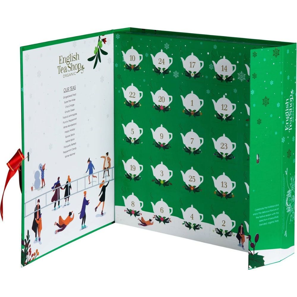 Adventskalender open. 25 deuren met theepotmotieven. Links: lijst met theesoorten. Rood lint.