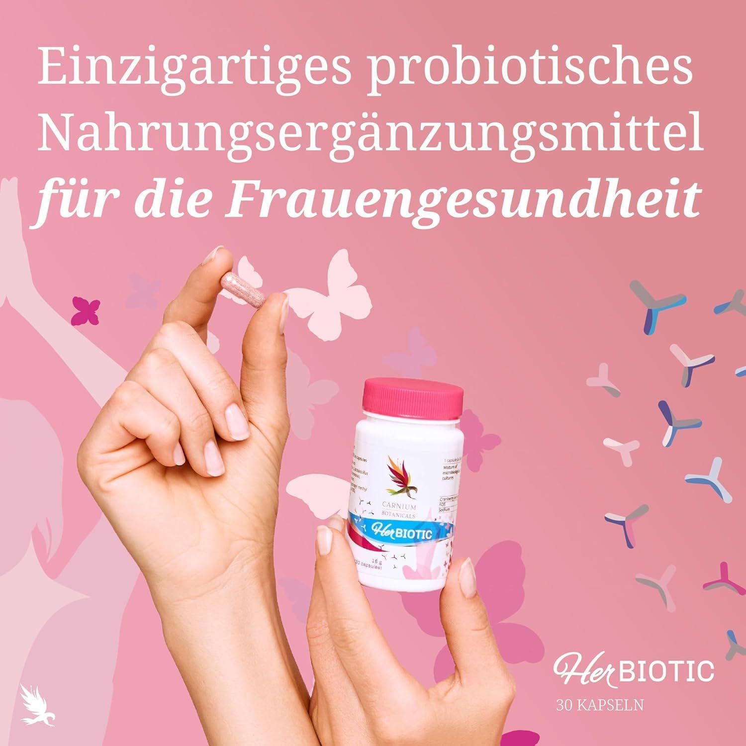 Handen houden capsule en HerBiotic fles vast. Roze achtergrond. Tekst: voedingssupplement voor vrouwengezondheid. 30 capsules.