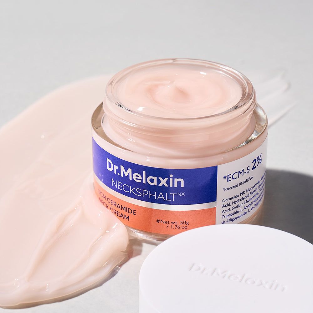 Crème pour le cou Dr.Melaxin NECKSPHALT™ dans un pot de 50g. La crème est rose pâle avec une texture crémeuse.