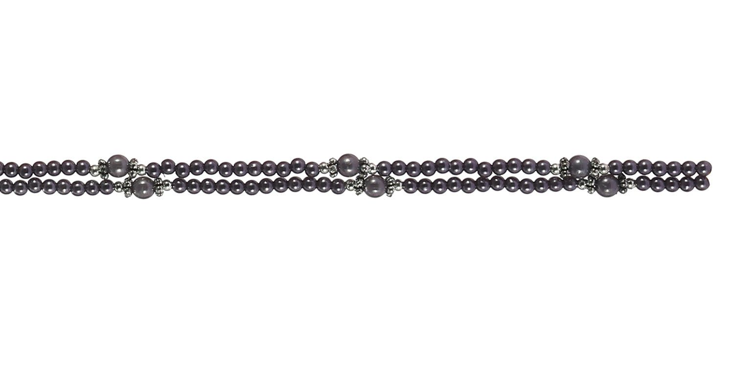 Brillenketting met dubbele rij donkere kralen. Zilverkleurige accenten. Einden met lussen voor brilpoten.