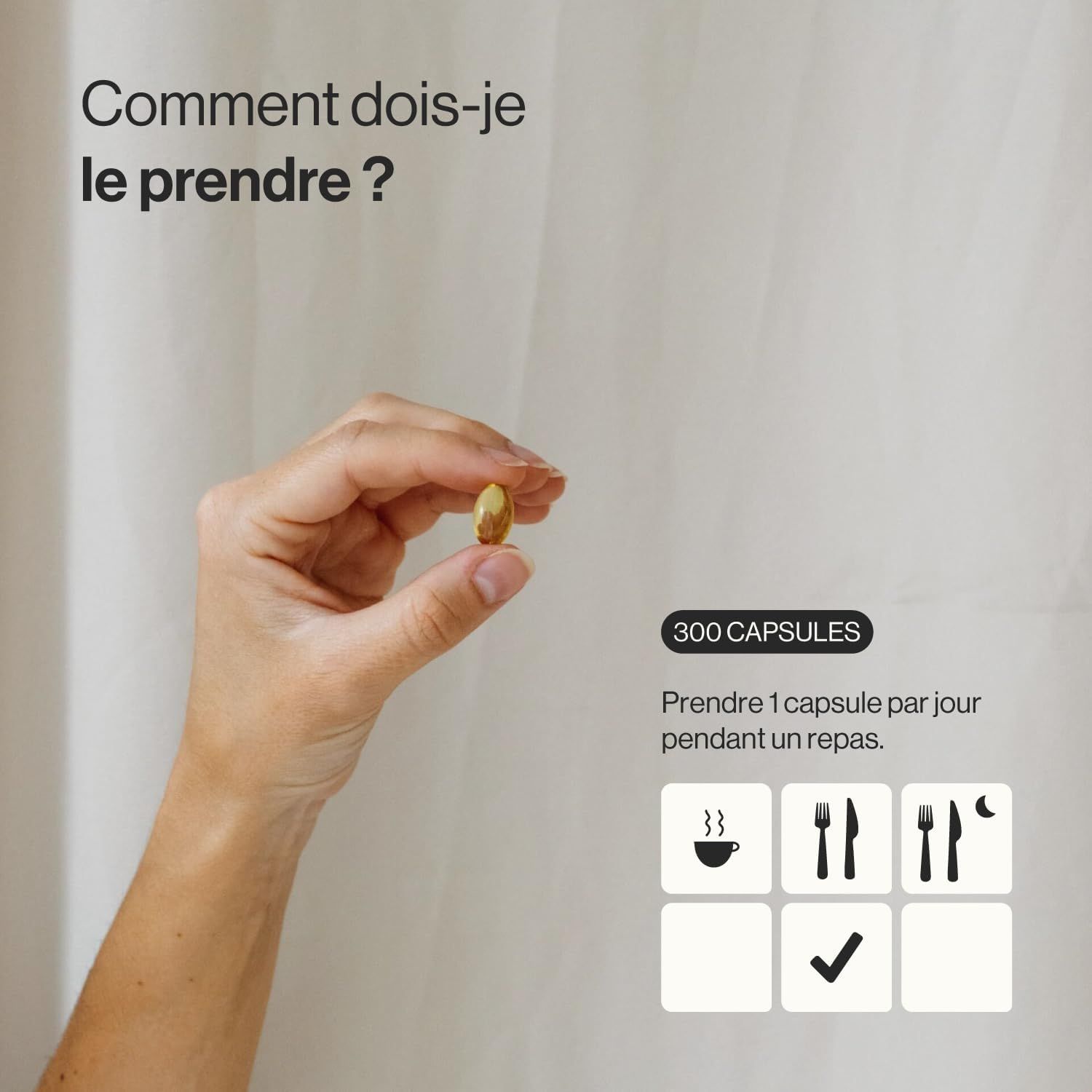 Une main tient une capsule dorée. Des instructions de prise et 300 capsules sont indiquées à côté.