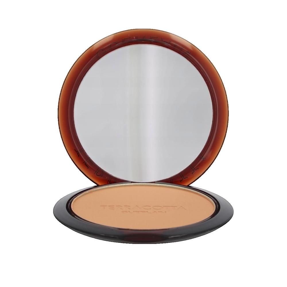 Boîtier de poudre bronzante rond ouvert, avec miroir. Inscription Terracotta. Bord marron.