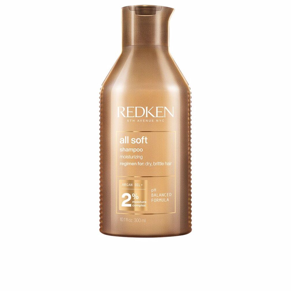 Gouden shampoo fles. Opschrift: Redken, all soft, shampoo. Bevat arganolie en 2% vochtcomplex. pH-gebalanceerd.