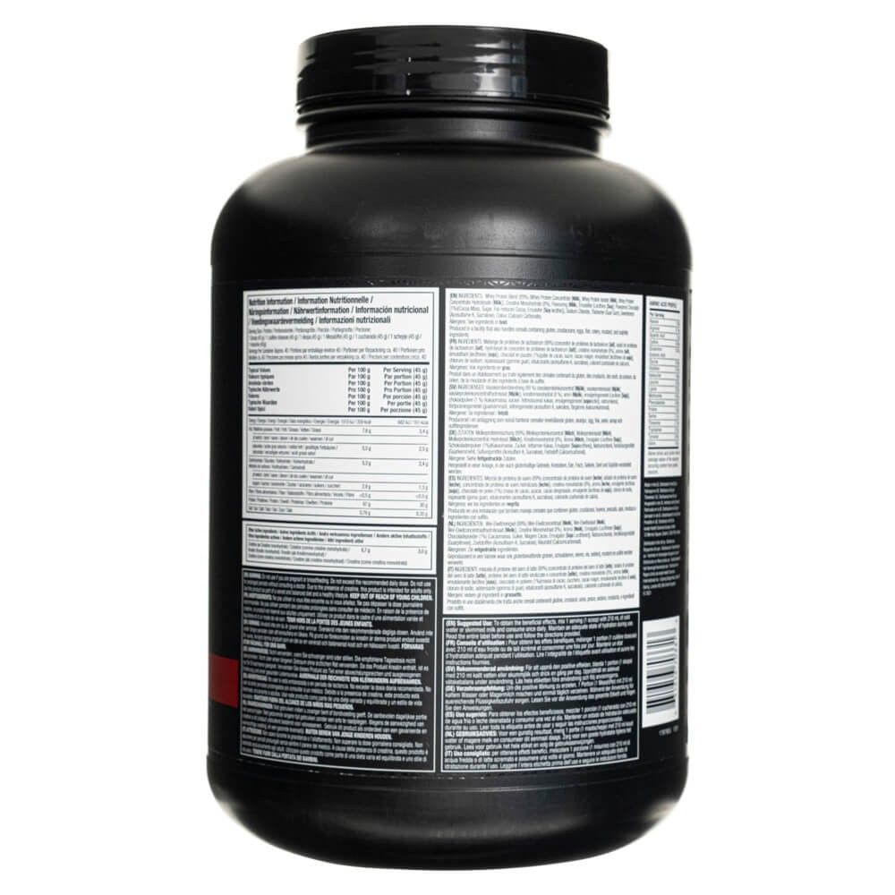 Arrière d'un récipient noir de protéine de lactosérum Muscletech Nitro-Tech. Contient des informations nutritionnelles détaillées et des informations multilingues.