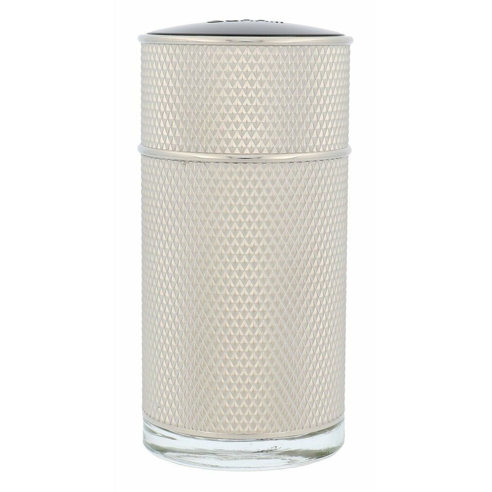 Flacon cylindrique argenté texturé en losanges. Bouchon noir. Base en verre.