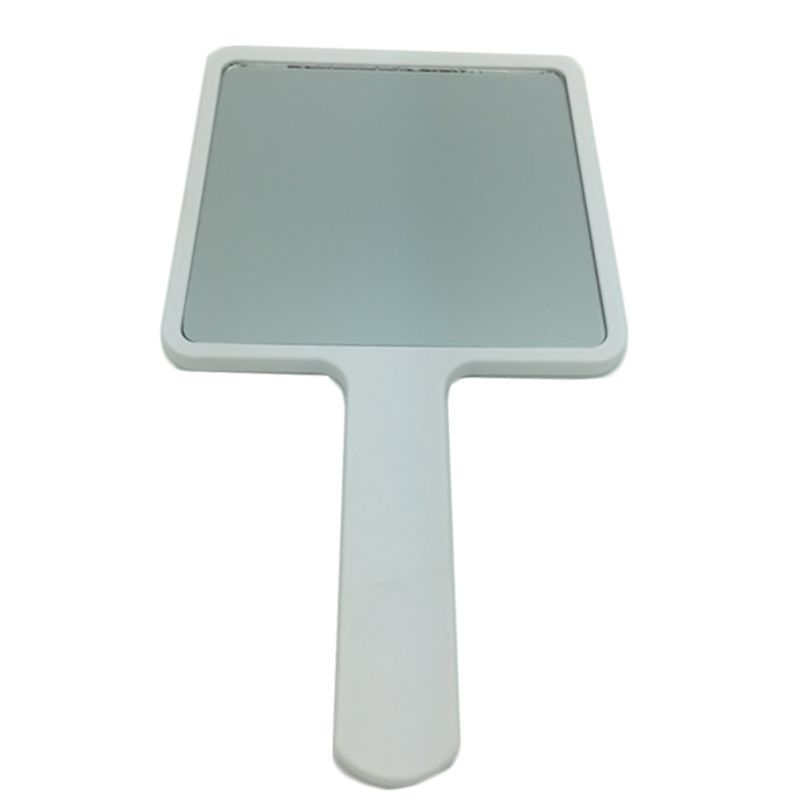 Miroir à main carré blanc avec manche.