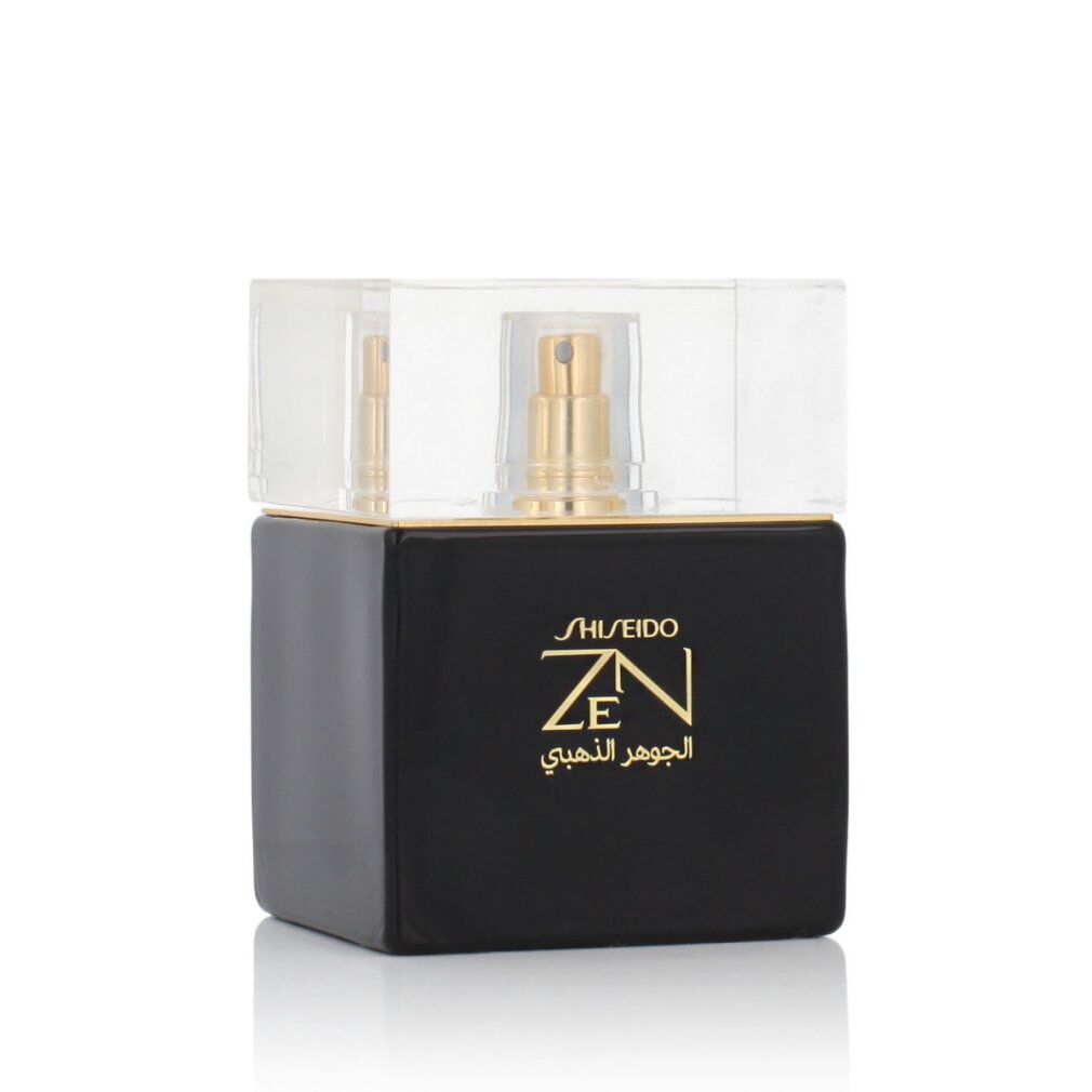Zwarte flacon met gouden verstuiver en dop. Shiseido Zen Elixir De Oro, gouden tekst.