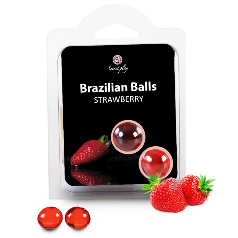 Emballage avec deux billes brésiliennes rouges et des fraises. Marque : Secret Play.
