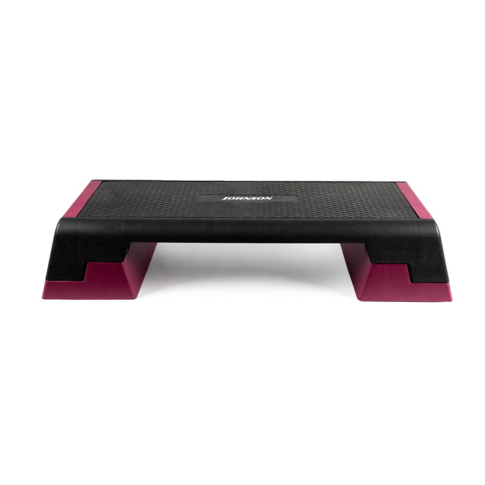 Aerobic stepper. Zwart en roze. Gekarteld oppervlak. Merk JOHNSON.
