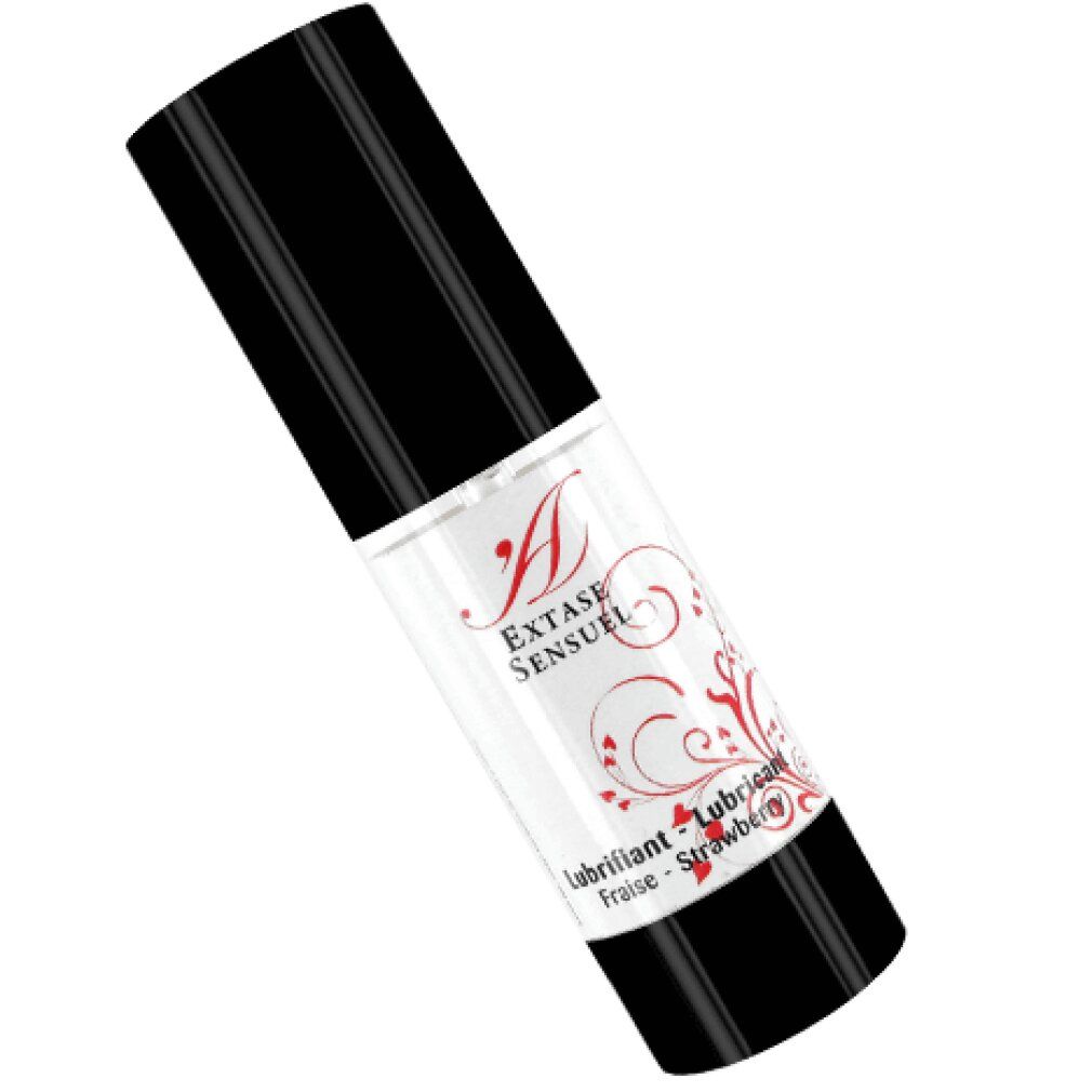 Flacon de lubrifiant saveur fraise, incliné, bouchon noir, motif de cœur rouge sur l'étiquette.
