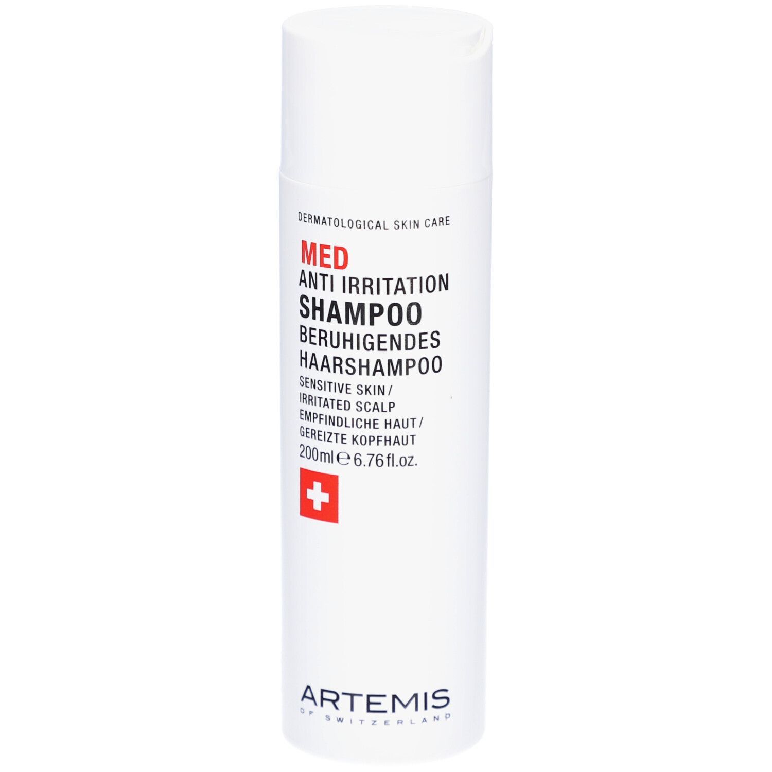Flacon blanc avec texte rouge et noir. Croix suisse. Nom du produit: Med Anti Irritation Shampoo. Marque: Artemis.