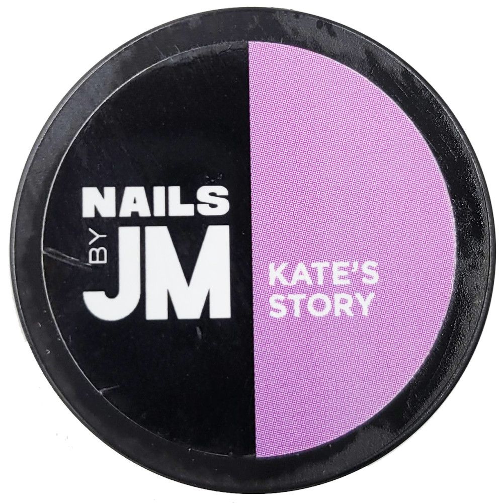 Contenant rond divisé en noir et lilas. "NAILS BY JM" sur le noir. "KATE'S STORY" sur le lilas.