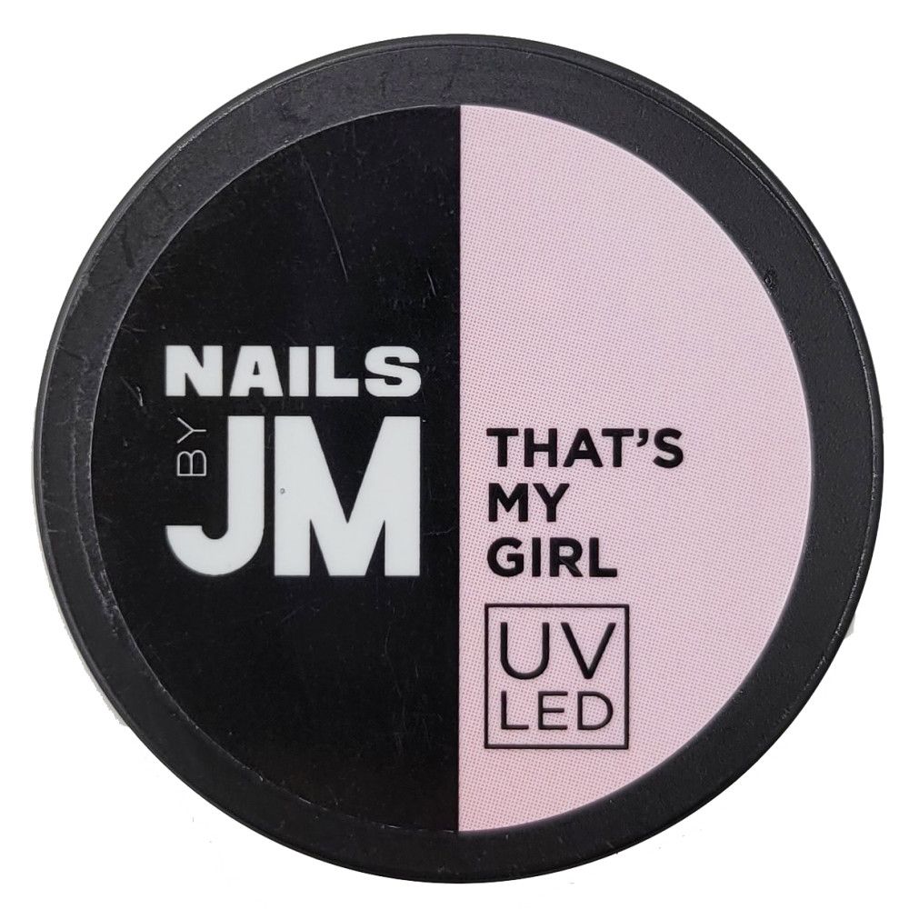Contenant rond divisé en noir et rose. Inscriptions "NAILS BY JM" et "THAT'S MY GIRL". Avec indication UV LED.