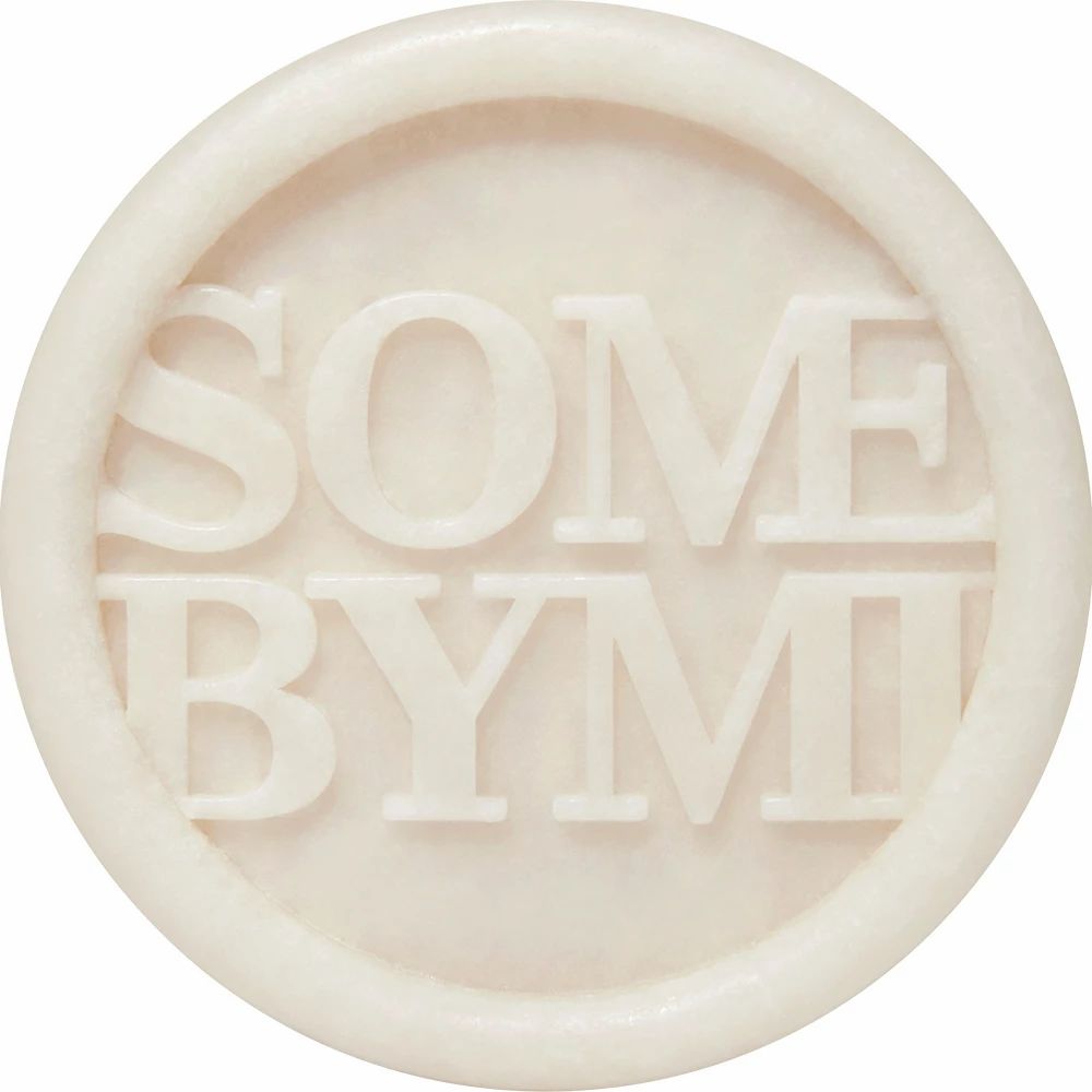 Savon rond avec le texte SOME BYMI dans un cercle.