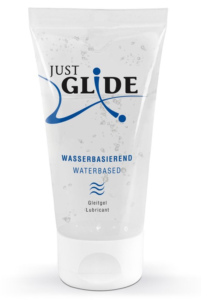 Tube de gel transparent. Inscription : JUST GLIDE, à base d'eau, gel lubrifiant. Bouchon blanc.