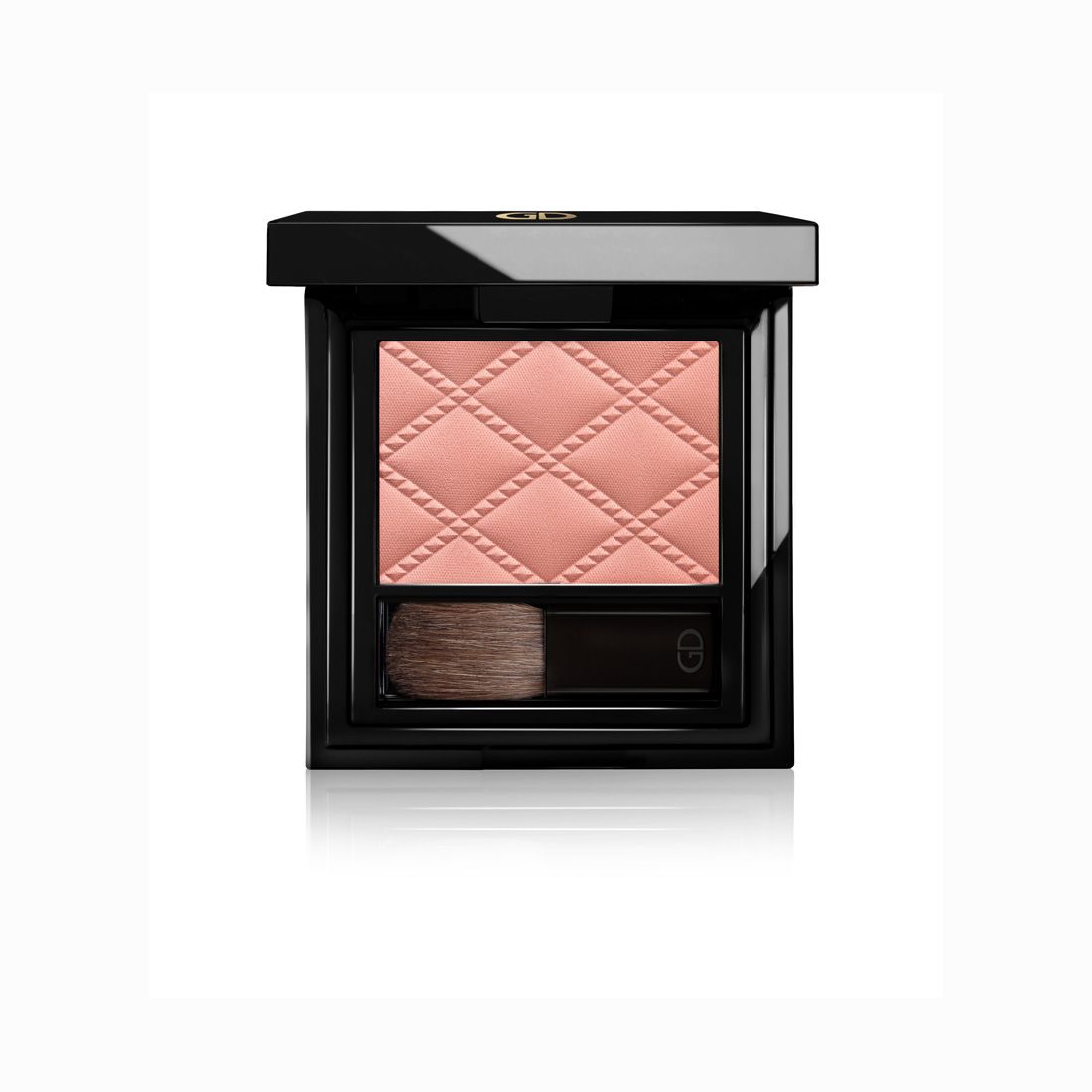 Blush compact noir. Poudre rose avec motif losange. Comprend un pinceau.