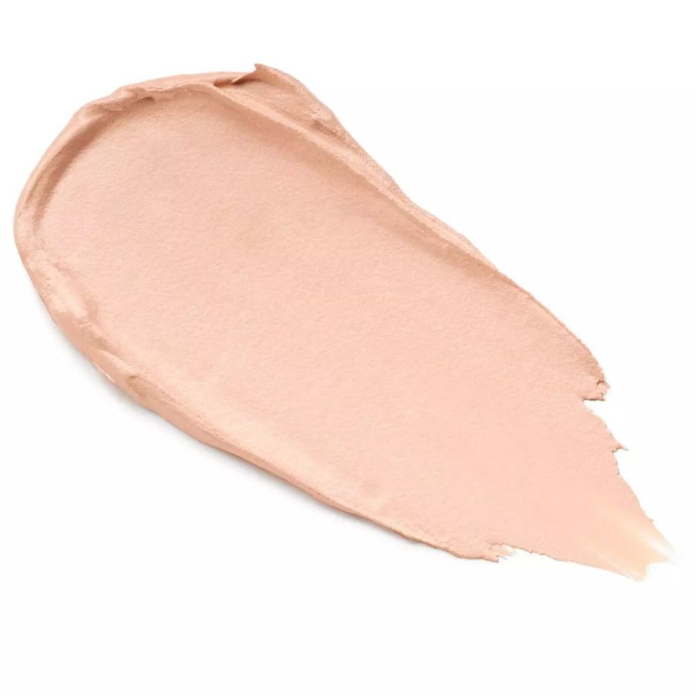 Nuance crème claire sur fond blanc. Texture appliquée en une bande incurvée.