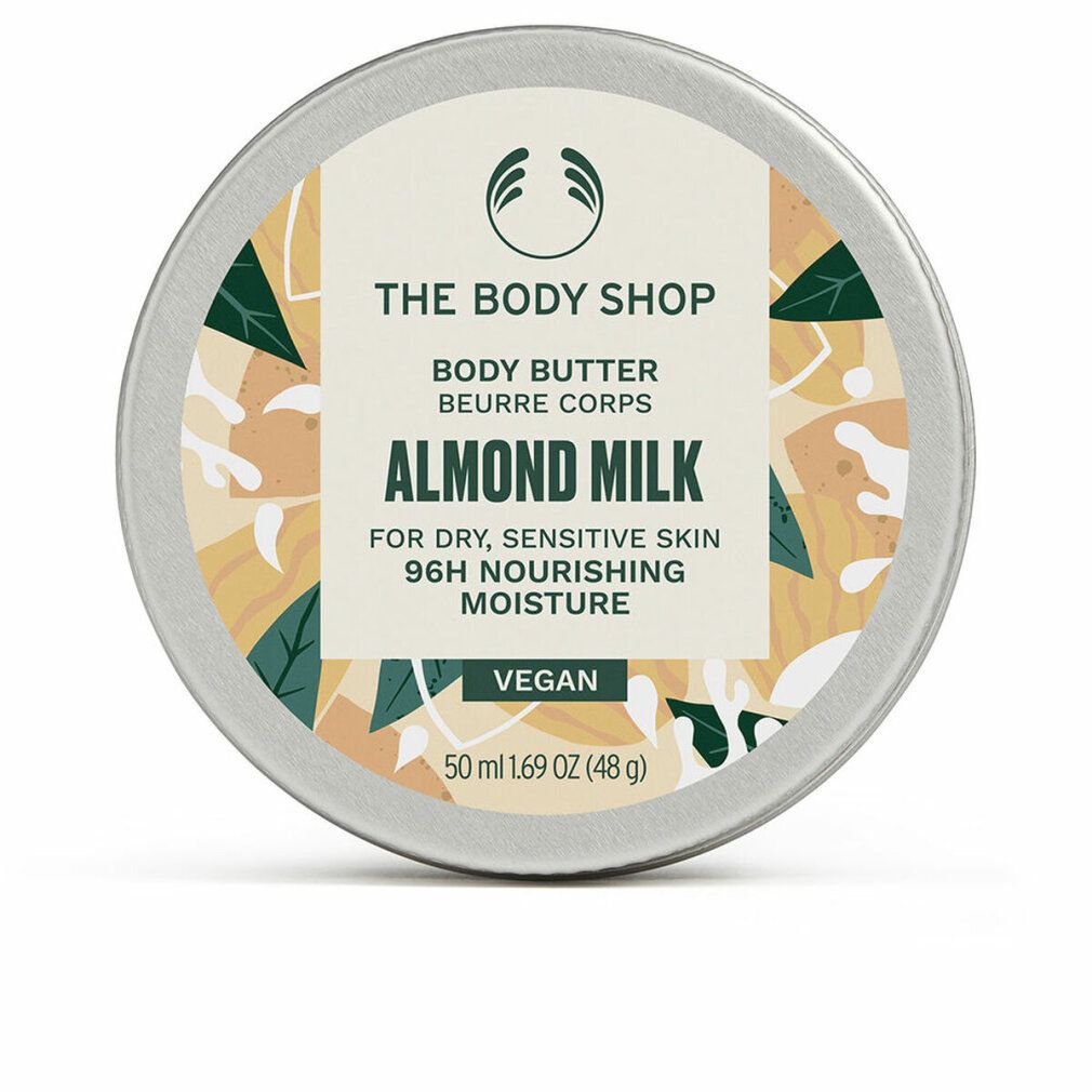 Pot rond de beurre corporel The Body Shop. Inscription : Almond Milk, pour peaux sèches et sensibles. Vegan. 50 ml.
