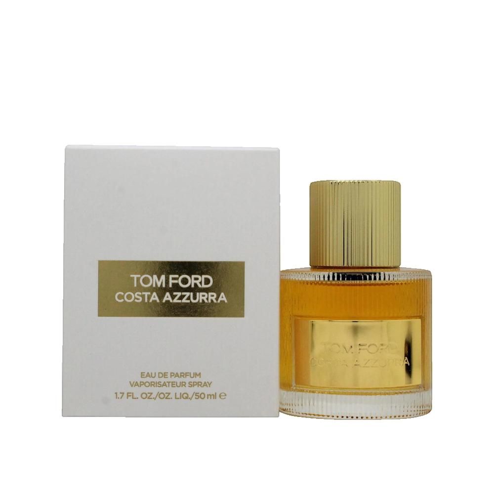Parfumfles en verpakking. Glazen fles met gouden dop. Op de verpakking staat "Tom Ford Costa Azzurra".