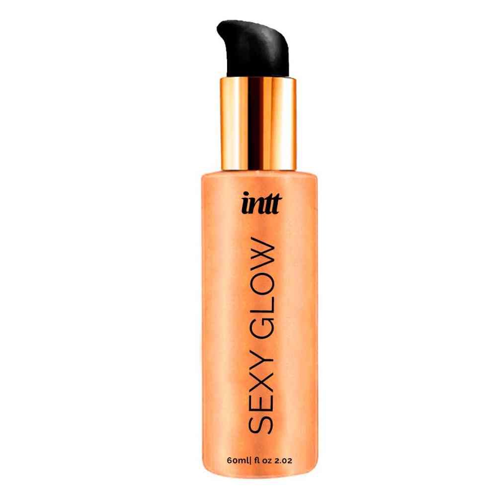 Body illuminator met pomp. Gouden dop, oranje fles met opschrift "SEXY GLOW".