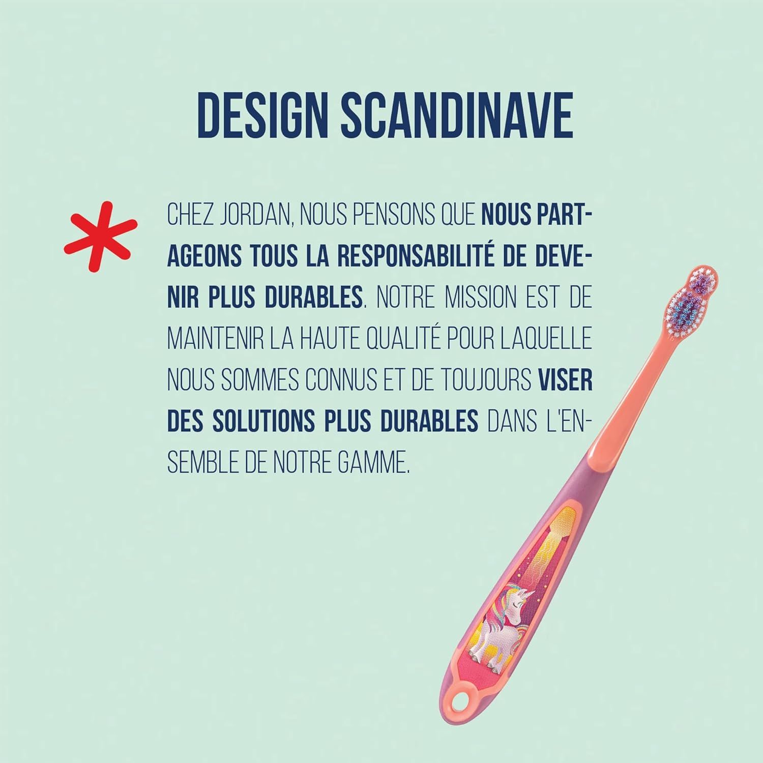 Brosse à dents avec manche rose et motif licorne. Poils bleus et roses.