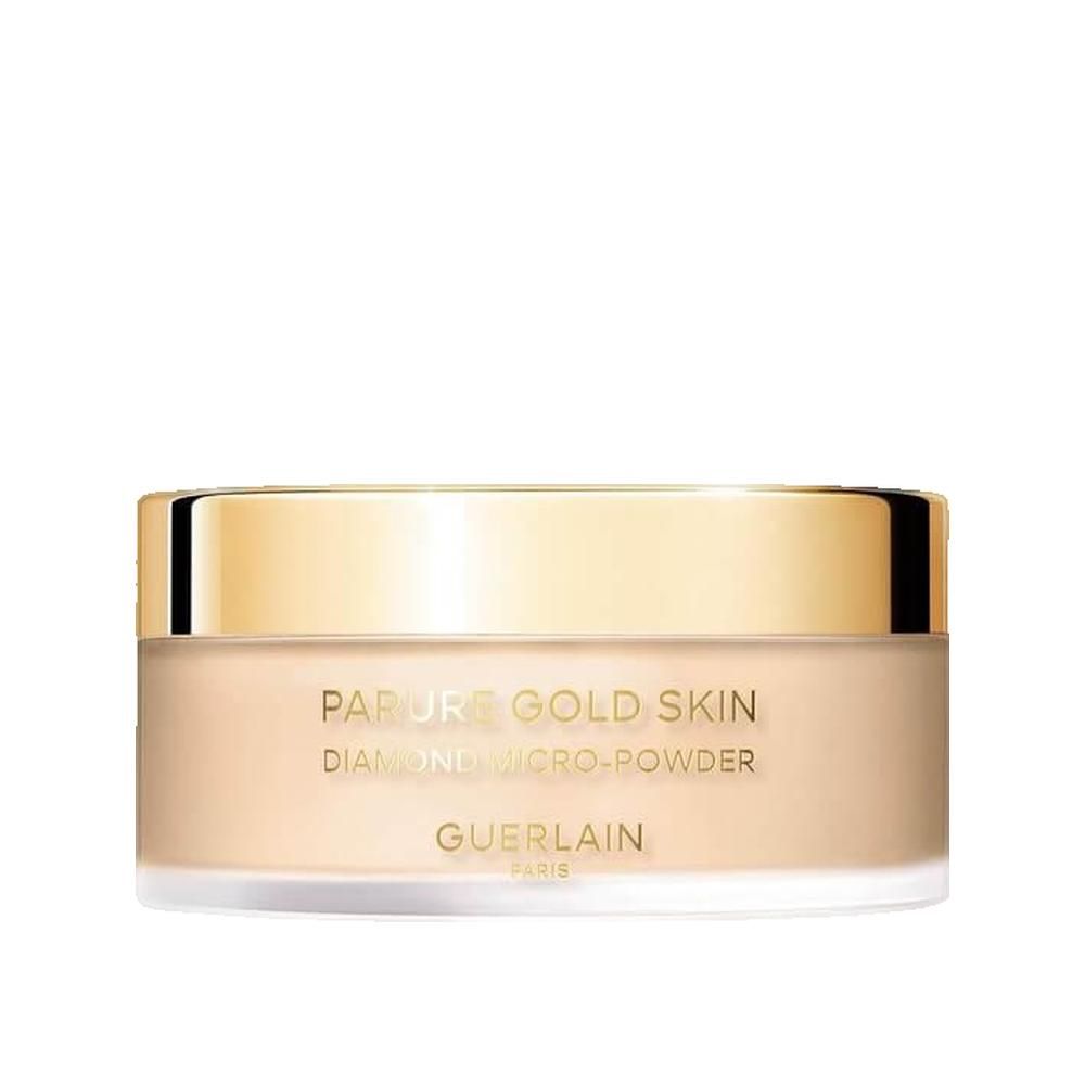 Beige poeder in een ronde pot met gouden deksel. Opschrift: PARURE GOLD SKIN, DIAMOND MICRO-POWDER, GUERLAIN PARIS.